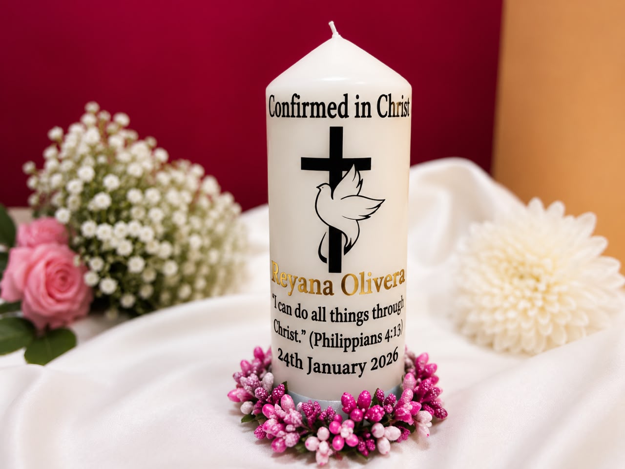 Confirmation candle with cross, dove and a pink floral ring at the base